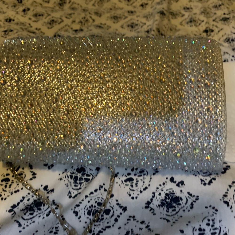 Soarkly crystal studded silver evening bag with detachable shoulder chain